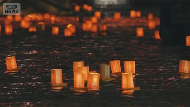 夏の夜を彩る幻想的な光　東京・隅田川「とうろう流し」